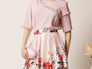 Fusta midi roz din tafta in clos cu flori la baza si pliuri